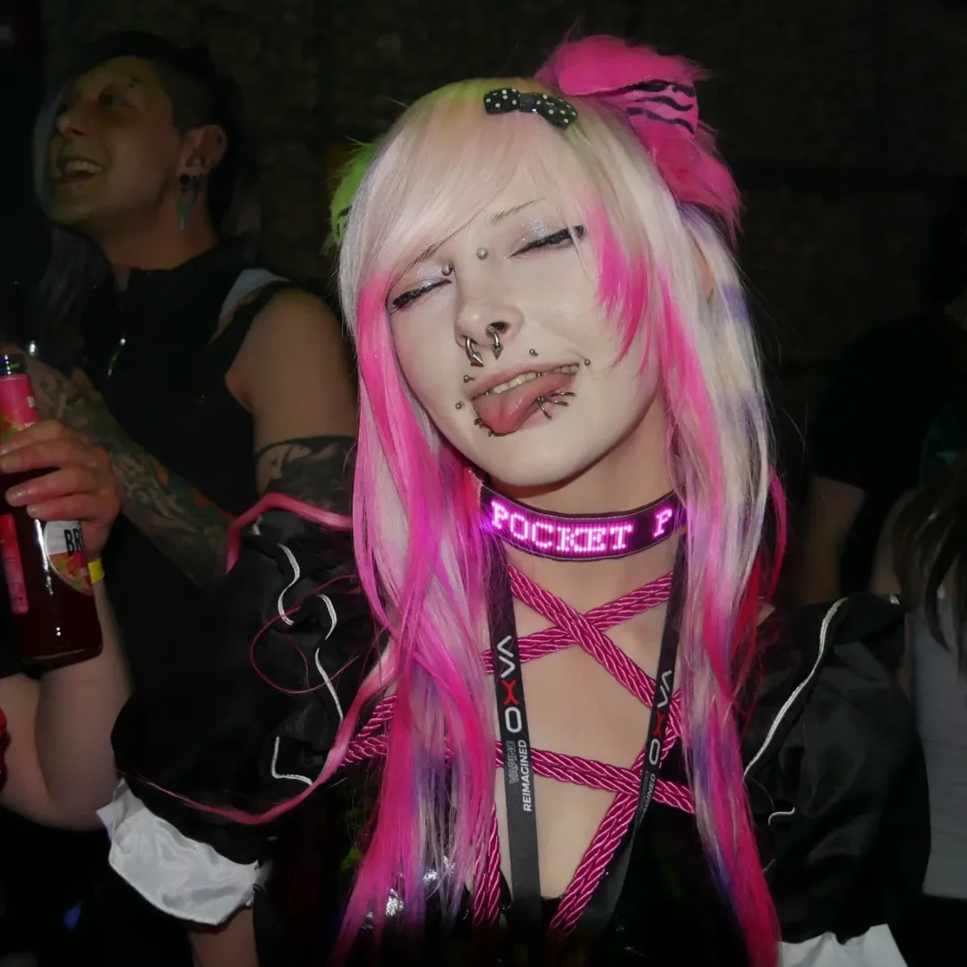 Attendee with pink anime-inspired styling